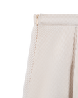 Luxury Western Golf apparel Close-up of a beige corduroy pants with a zipper on a white background